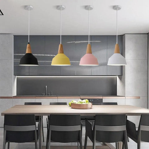KCEYANB Adjustable Height Pendant Light Modern Simplicity Metal Hanging Lamp in black, yellow, pink, and white above a dining table.