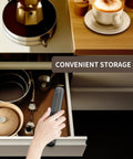 Rechargeable Handheld Milk Frother With Dual Coil Whisk Head Electric Coffee Frother Wand stored in a kitchen drawer