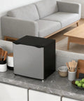 Compact Upright Freezer Silver 1.1 Cu Ft Countertop Mini Freezer Solid Pick For Dorms And Offices on a kitchen counter.