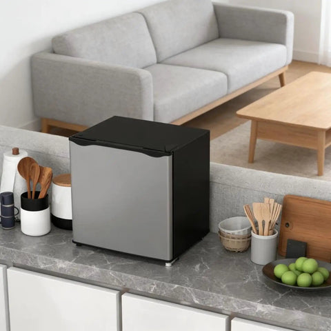 Slick Compact Upright Freezer Sweet Countertop Mini Fridge Silver 1.1 Cu Ft Storage on marble countertop with kitchen utensils.