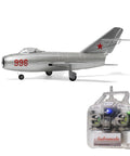 MiG-15 Micro EDF RC Plane With 4CH 2.4GHz Gyro Stabilized Jet Ducted Fan shown with remote control