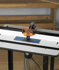 Heavy Duty Solid Phenolic Router Table Top With A Slick Ultra Flat Surface And Tight Ten Point Plate Leveling Rig Featuring Universal T Profile Slot For A Pro Woodshop Must Have Upgrade in use with T track and router.