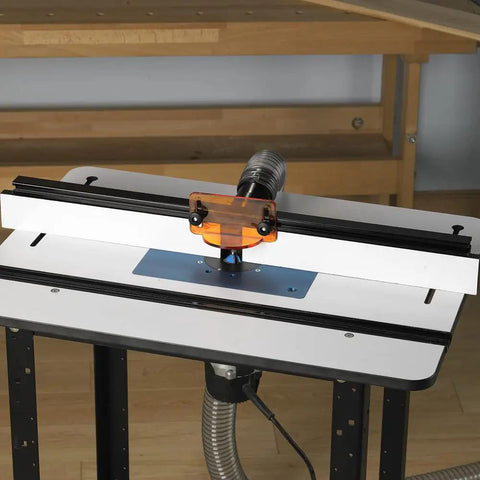 Heavy Duty Solid Phenolic Router Table Top With A Slick Ultra Flat Surface And Tight Ten Point Plate Leveling Rig Featuring Universal T Profile Slot For A Pro Woodshop Must Have Upgrade in use with T track and router.