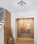 Modern Crystal Flush Mount Ceiling Light 11.8 Inch Square Mini Chandelier in a foyer with wooden walls and contemporary decor.