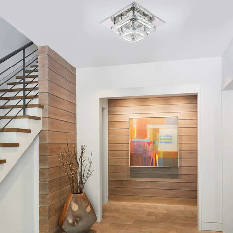Modern Crystal Flush Mount Ceiling Light 11.8 Inch Square Mini Chandelier in a foyer with wooden walls and contemporary decor.