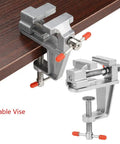 Rock Solid Mini Flat Pliers Bench Vise And Tabletop Clamp For Precision Woodwork Drill Press Vice Slick Aluminum Alloy Tool on a wooden surface.