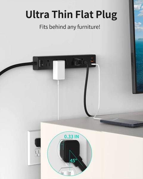 Wall-mounted Ultra Thin Flat Plug Power Strip with 6 outlets and 3 USB ports beside a desk, fitting snugly behind furniture.