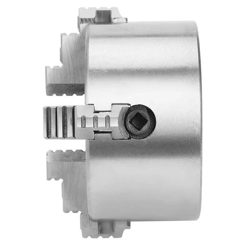 Premium 4 Inch Independent Four Jaw Lathe Chuck Featuring Reversible Steel Jaws, showing detail of jaws and wrench socket.
