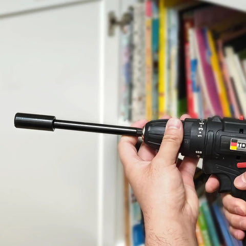 Seven Inch Forstner Bit Extension With 3/8 Drill Bit Extender attached to a drill, showing reach for deep hole drilling.