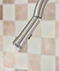 Close-up of Top Shelf Pulldown Kitchen Faucet In Slick Spot Resist Stainless Steel with 360 swivel spray wand.