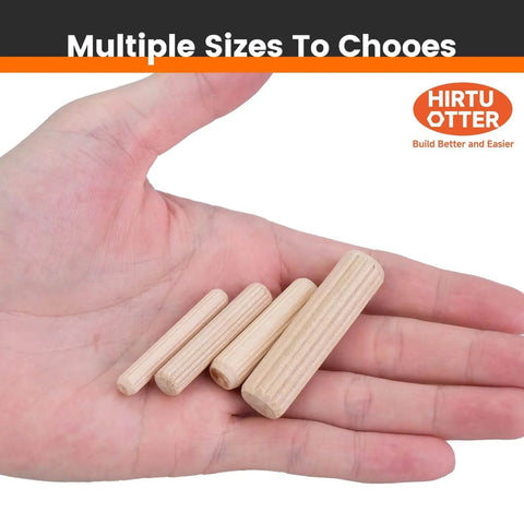 Hand holding 50 Piece Hardwood Dowel Pins 1/2 Inch By 2 Inch Kiln Dried Schima Superba Fluted And Beveled for woodworking projects