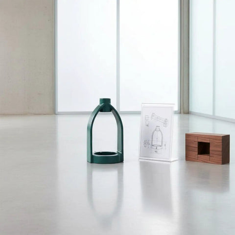 Heavy Duty Mortising Machine Drill Press Attachment with green steel body, technical drawing, and wooden block on floor.