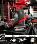 M12 RedLithium High Output 2.5Ah Battery with drill in workshop setting, resistant to oils, greases, and solvents