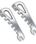 Eyeglass Frame Calibration Tool With Multidirectional Slots And Ergonomic Non Slip Grip For Precise Alignment And Nose Pad Adjustment A Handy Travel Friendly Gizmo For Home Or Office Use showing metal tools with slots