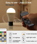 Person using remote with Rechargeable USB Light Bulbs With Remote And Timer 3CCT 3000K To 6000K 10 Level Brightness Two Pack