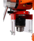 Close-up of Compact 10 Inch Benchtop Drill Press With Enclosed Class I Laser Positioning System, showcasing chuck and laser aid.