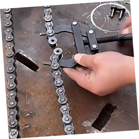 User adjusting a motorcycle chain using Pro Level Motorcycle Chain Tensioner Tool For Quick Adjustment And Easy Chain Removal Compact Bike Chain Adjuster.