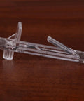 Close-up of a clear peg from the 30 Pack Plastic Shelf Support Pegs for Cabinets and Wood Shelves Burr Free Smooth Surface Pegs Easy Hand Installation