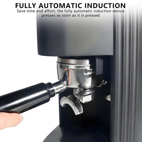 Game Changing 58Mm Automatic Espresso Tamper Machine With Touch Screen Dial And Adjustable Pressure For Hassle Free Coffee Puck Compaction In Tough Stainless Steel, showing user pressing lever.
