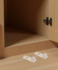 24 Pack Plastic Locking Shelf Brackets With Antislip Grooves For 20mm Cabinets And Bookshelves displayed near wooden cabinet