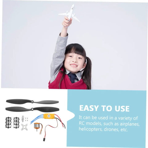 Pro RC Hobbyist Gear Pack Electronic Speed Controller and Screw Propellers with tools shown with a child holding an RC plane.