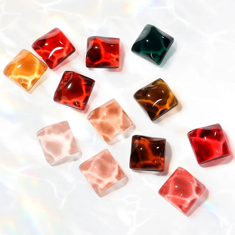 Transparent Icy Jelly Gel Nail Polish Kit With Soak Off UV LED Hema Free Vegan various colored gel cubes on white surface