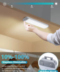 Person adjusting Motion Sensor Cabinet Light With 30 LED Dimmer Under Counter Closet Lighting Battery Powered Wireless USB Magnetic Night Lights For Kitchen Wardrobe Closet Cupboard 3 Pack.