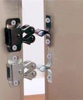 Double Roller Cabinet Door Catch Ball Latch in copper tone with prong installed on cabinet, 34 by 32 mm, 13 mm projection