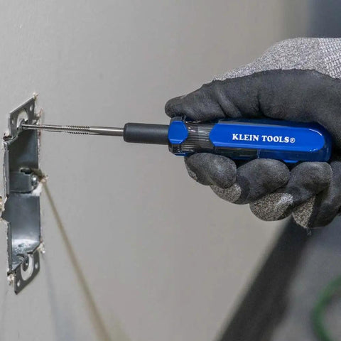 Using Klein Tools Triple Thread Taps Kit For 6 32 8 32 10 24 With Quick Rethreading to fix threads in a wall outlet plate.