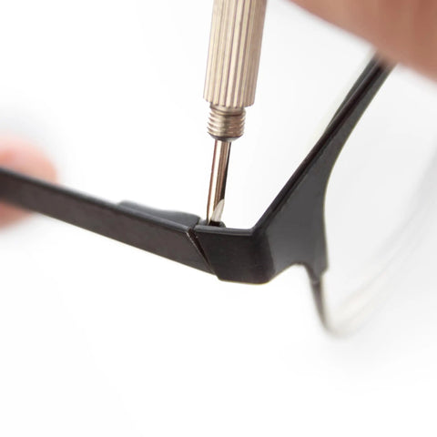 Close-up of a flathead screwdriver from 3-In-1 Eyeglass And Watch Repair Kit With Mini Screwdriver Set For On The Go Fixes adjusting eyeglass frame