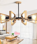 Modern Metal Pendant Chandelier With Five E27 Sockets And Compatible Slim Led Fixtures Sleek Black Finish hanging in stylish living area.