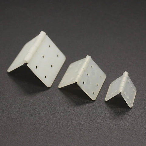 Three Nylon Hinges For RC Airplanes skrnrhrery Three Sizes, medium, small, large, showing square loose leaf design for model aircrafts