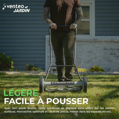Person using 18-Inch Push Reel Lawn Mower With 5 Blades, Heat-Treated Alloy Steel Blades, Scissor-Cut Action, outdoors on lawn