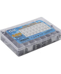 Clear box containing Massive 500Pcs Aluminum Electrolytic Capacitor Kit With 24 Value Range From 0.1uF To 1000uF And 10V 16V 25V 50V Ideal For Quick Electronics Repairs On Circuit Boards.
