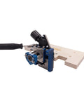 Side view of MortiseMate Loose Tenon Jig for Woodworking Easy Mortise Cutter with auto indexing, attached to a wooden surface.