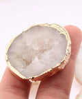 Close-up of white geode crystal knob from Geode Crystal Cabinet Knobs 4 Pack With Dope Gold Plated Gemstone Drawer Pulls For Kitchen Cabinets Dressers