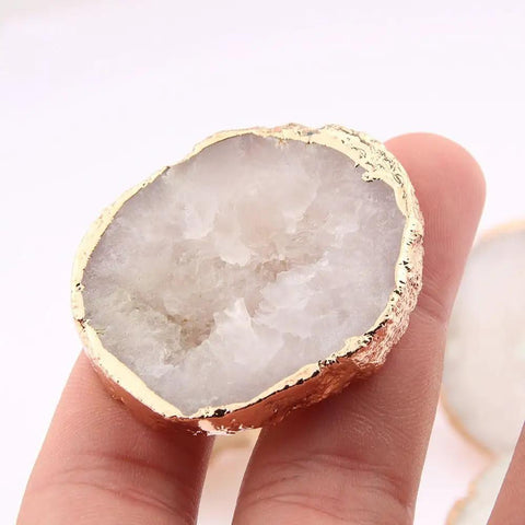 Close-up of white geode crystal knob from Geode Crystal Cabinet Knobs 4 Pack With Dope Gold Plated Gemstone Drawer Pulls For Kitchen Cabinets Dressers