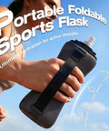 Runner holding Collapsible Silicone Handheld Water Bottle With Ergonomic Strap 350ml Blue Hydration Flask in clear sky