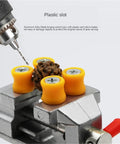 Mini Sucker Vise Two Pack For Drill Press And Workbench Handy Diy Carving Vise holding small part with drill bit in action