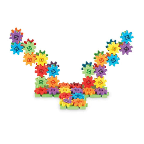 Gears 100-Piece Deluxe Building Set For STEM Fun arranged in colorful pattern with interlocking gears and connectors on a white background.