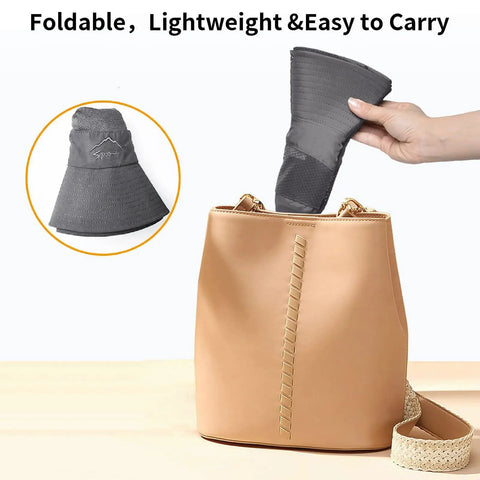 Go To Sun Hat For Men And Women With UPF 50 Plus Protection being folded and placed in a beige bag, illustrating portability.