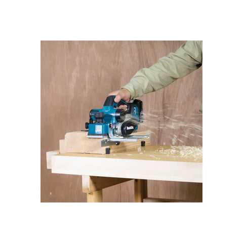 Badass Brushless Cordless Planer With 18v Lithium Power And An 82mm Precision Cutting Width For Sleek Finish Work Job Site Ready Bare Tool Build in use, smoothing wood with sawdust flying.