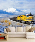 Steam Locomotive Wall Mural With Self Adhesive Backing featuring yellow train in snowy mountain scene, large living room decor