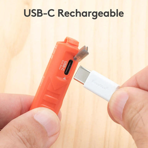 USB-C charging port on orange Tiny Pocket Sized USB C Rechargeable Keychain Flashlight Delivers 650 Lumens for EDC