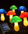 Colorful Mushroom Solar Lights for Outdoors Pack of 6 LED Garden Stake Decor with 8 Modes glowing in garden