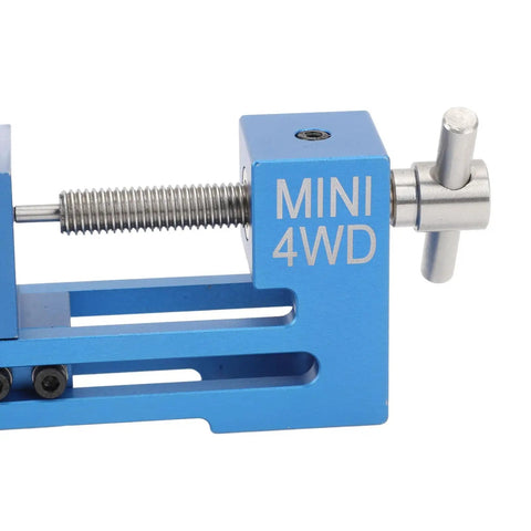Close-up of Lightweight Aluminum RC Tire Installer Wheel Loader For Mini 4WD Racers with smooth grip handle in blue.