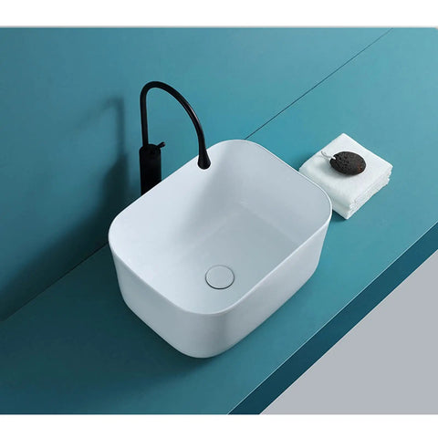 USZWBY Bathroom Vessel Sink White Bathroom Sink Fillet Deepen Basin Design Ceramic Vessel Sink Art Basin Above Counter Bathroom Sink on teal countertop with towel.
