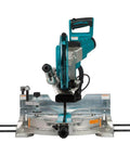 Makita 10-inch dual-bevel sliding compound miter saw with laser, teal body and silver base, front view.