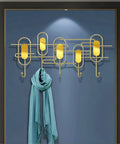 Heavy Duty Iron Wall Hooks Game Changer Home Upgrade For Entryways And Bedrooms Decor Sturdy Metal Coat Rack With Sleek Finish holding a blue scarf.