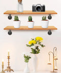 Built Tough Pipe Shelf Brackets Set 4 Pack Black L Shaped Iron Shelving Brackets 4x4 Inch holding wooden shelves with decor